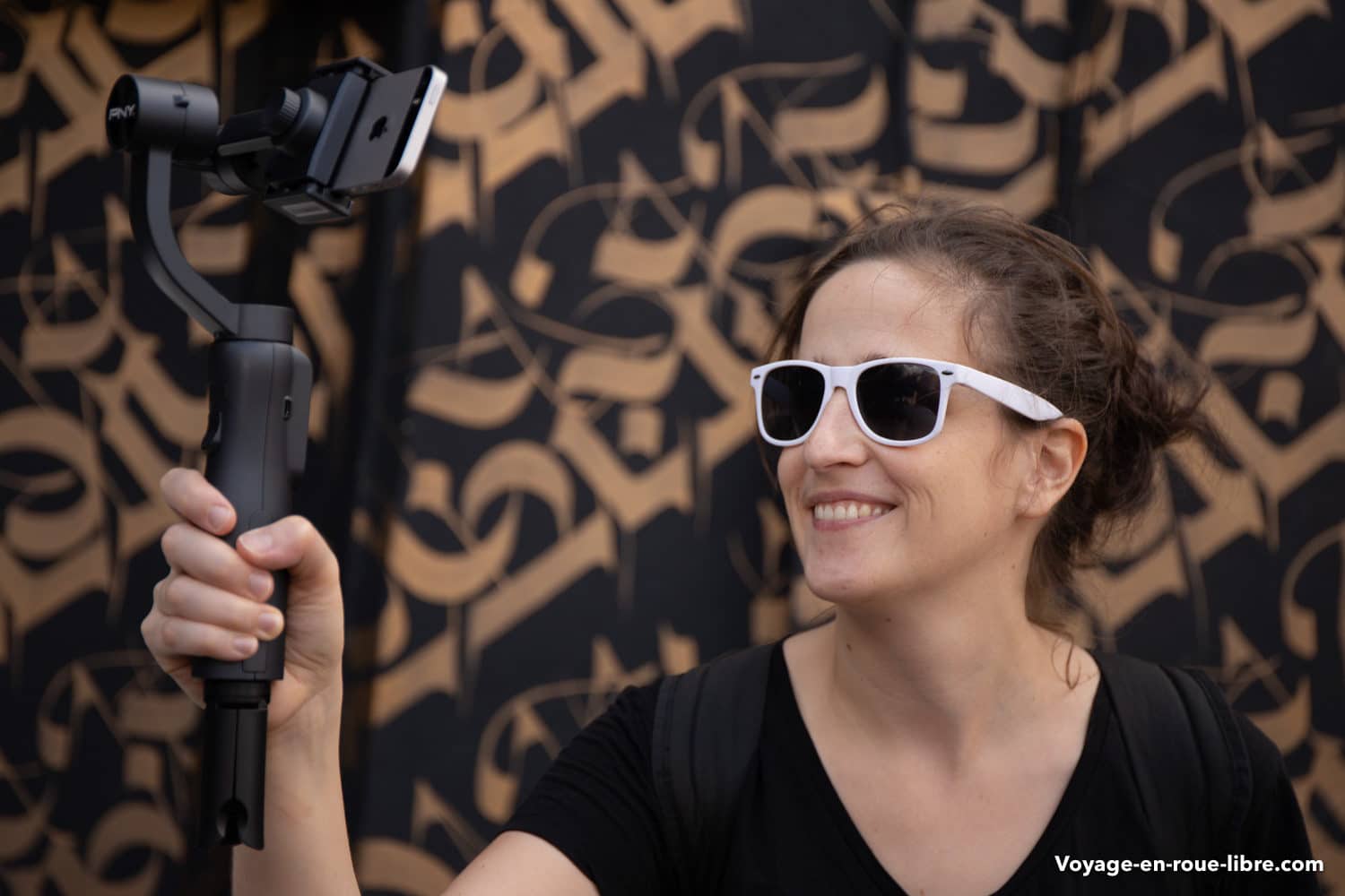 Clem filme avec le stabilisateur pour smartphone de PNY au festival MURAL de PNY